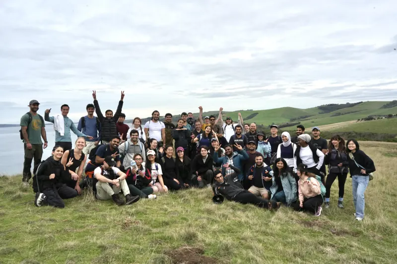 Social Hikes Australia group scrambling over rocks beside the river in Werribee Gorge — photo 9